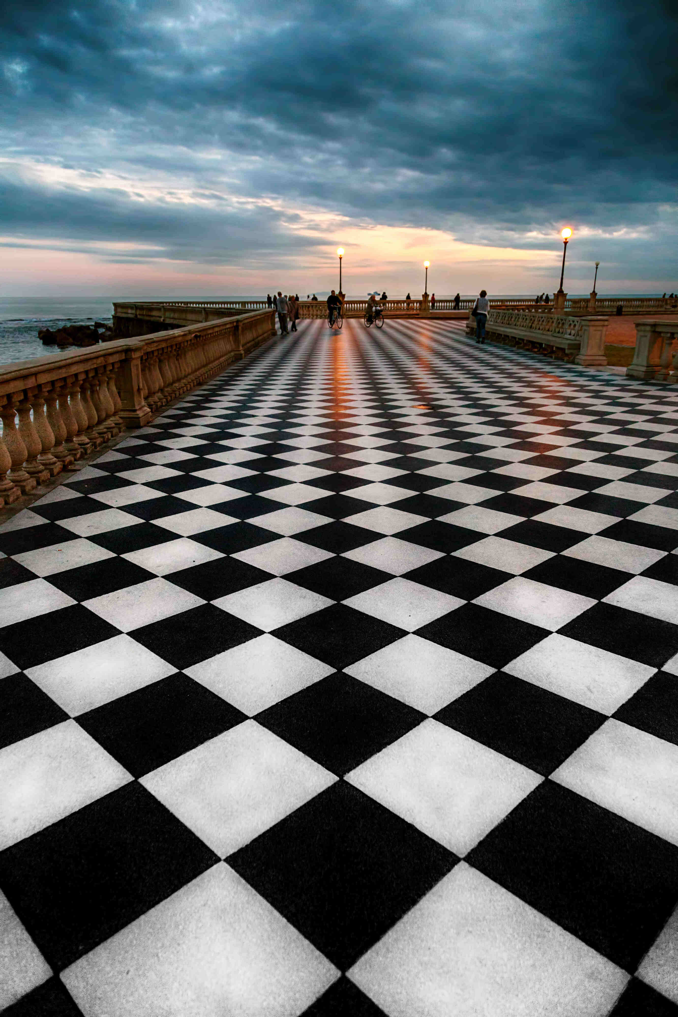 Walk along the boardwalk with a large checkered terrace by the sea
