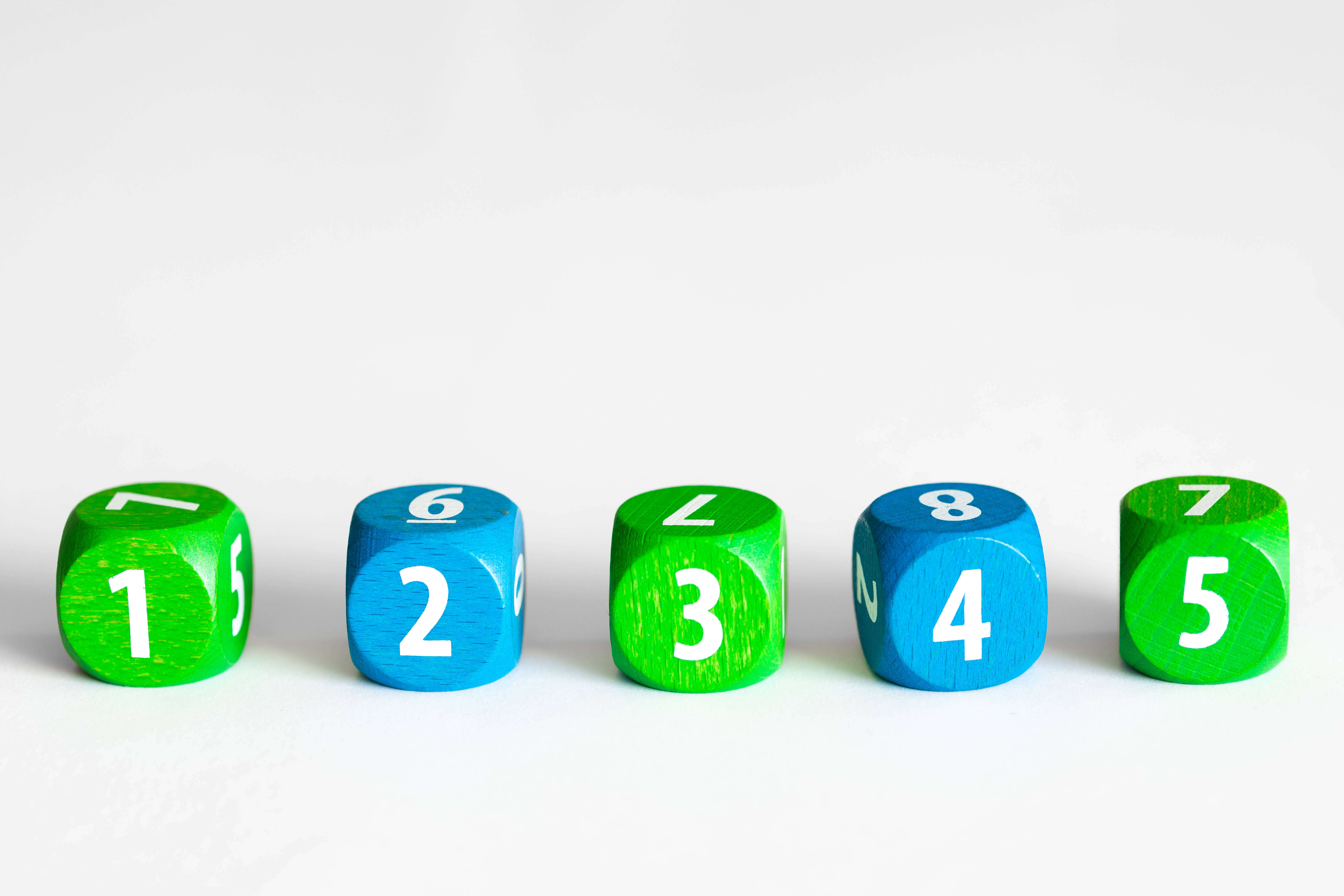 Take a trip around the board after rolling the numbered blue and green dice