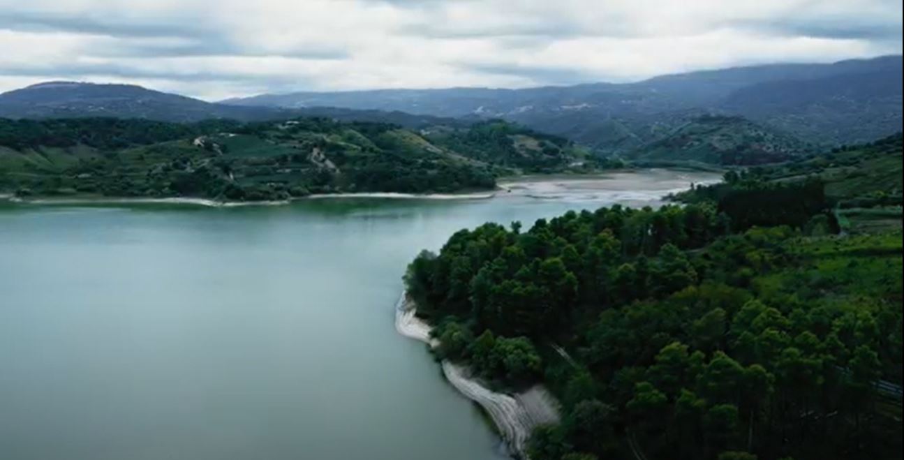 Stock footage of an aerial view of a cloudy lake!