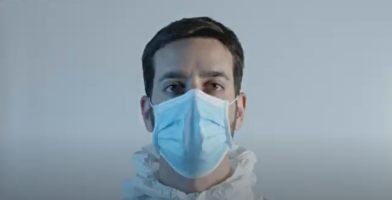 Doctor wearing a protective suit stock video