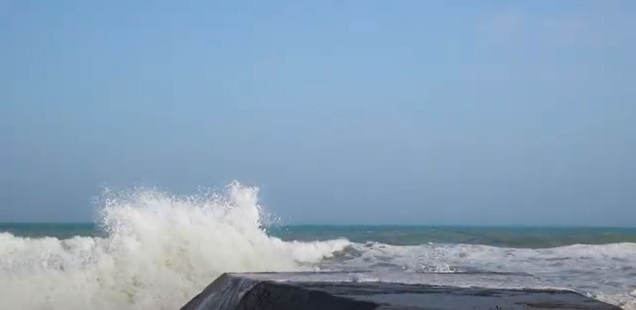 Waves crashing against a sea wall stock footage
